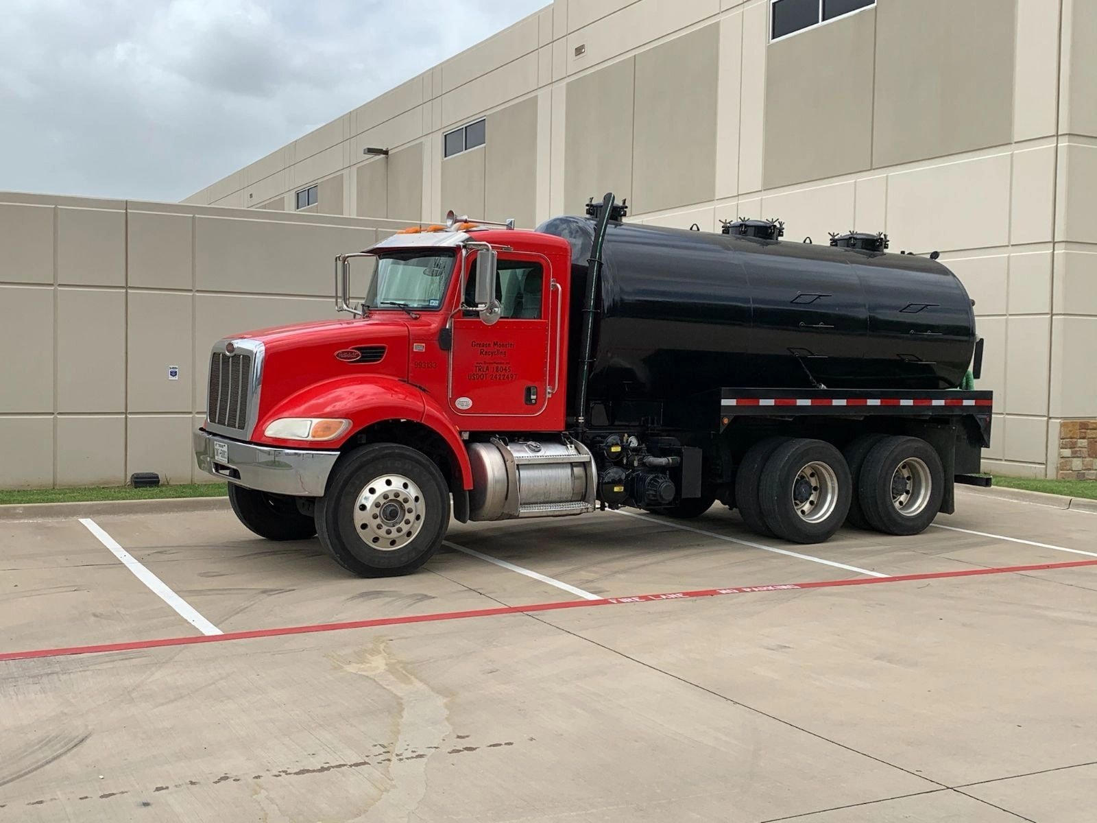 Grease Monster Recycling red tanker truck