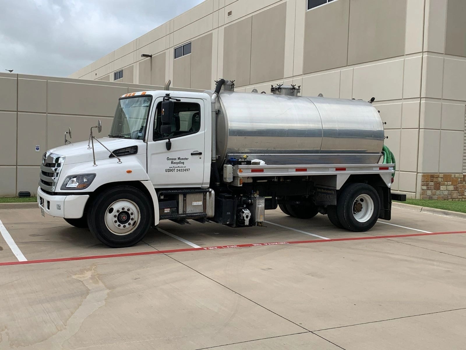 Grease Monster Recycling white tanker truck